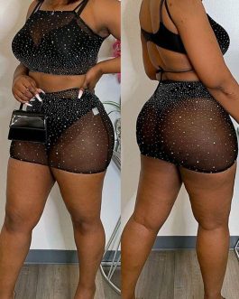 Body sexy et mini jupe strass